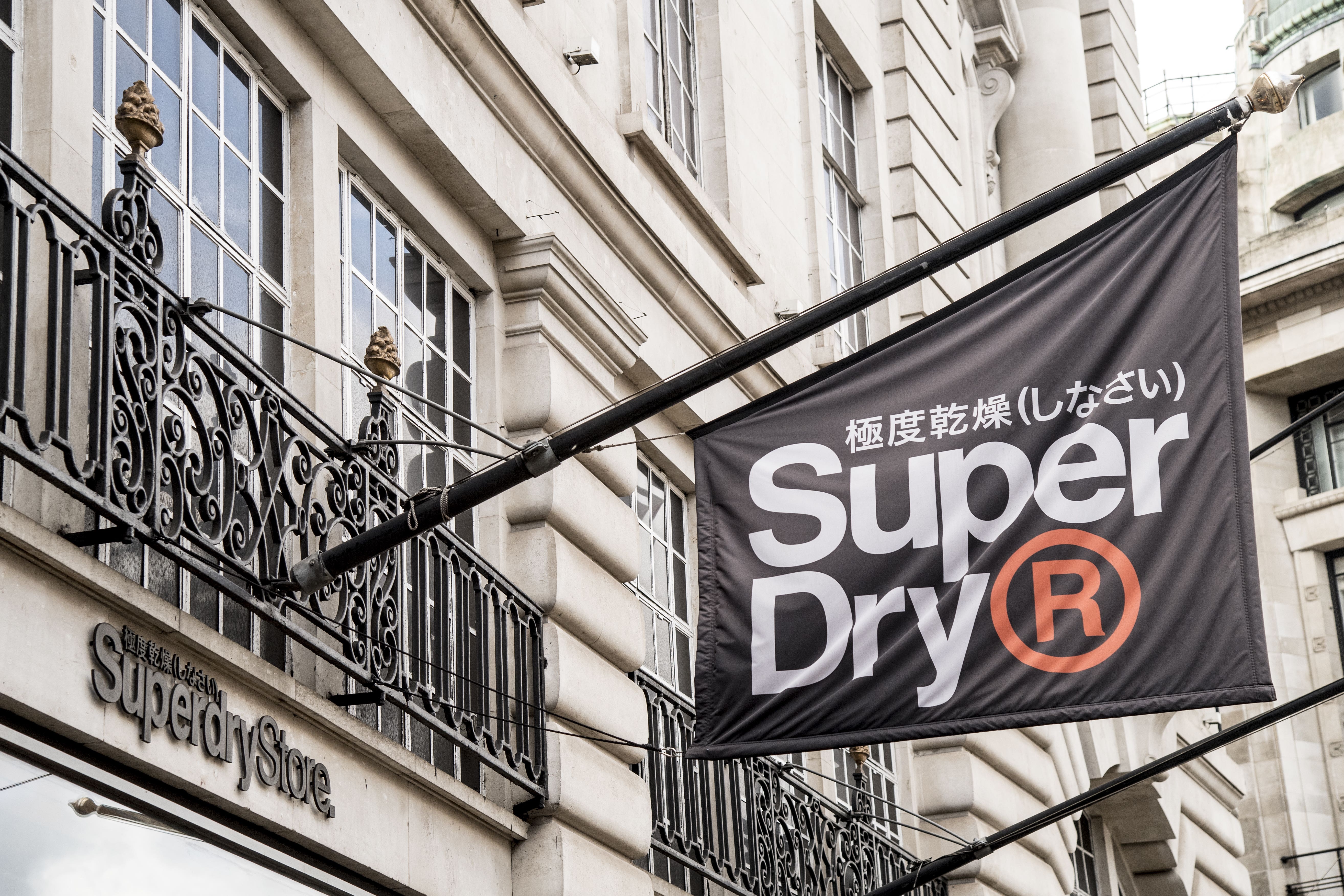 SuperDry has said it is assessing “cost saving options” with advisors after reports it could stores and jobs (Ian West/PA)