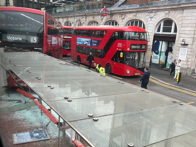 <p>Images showed a number of glass windows at the bus stop shattered after it was apparently hit by the number 13 bus.</p>