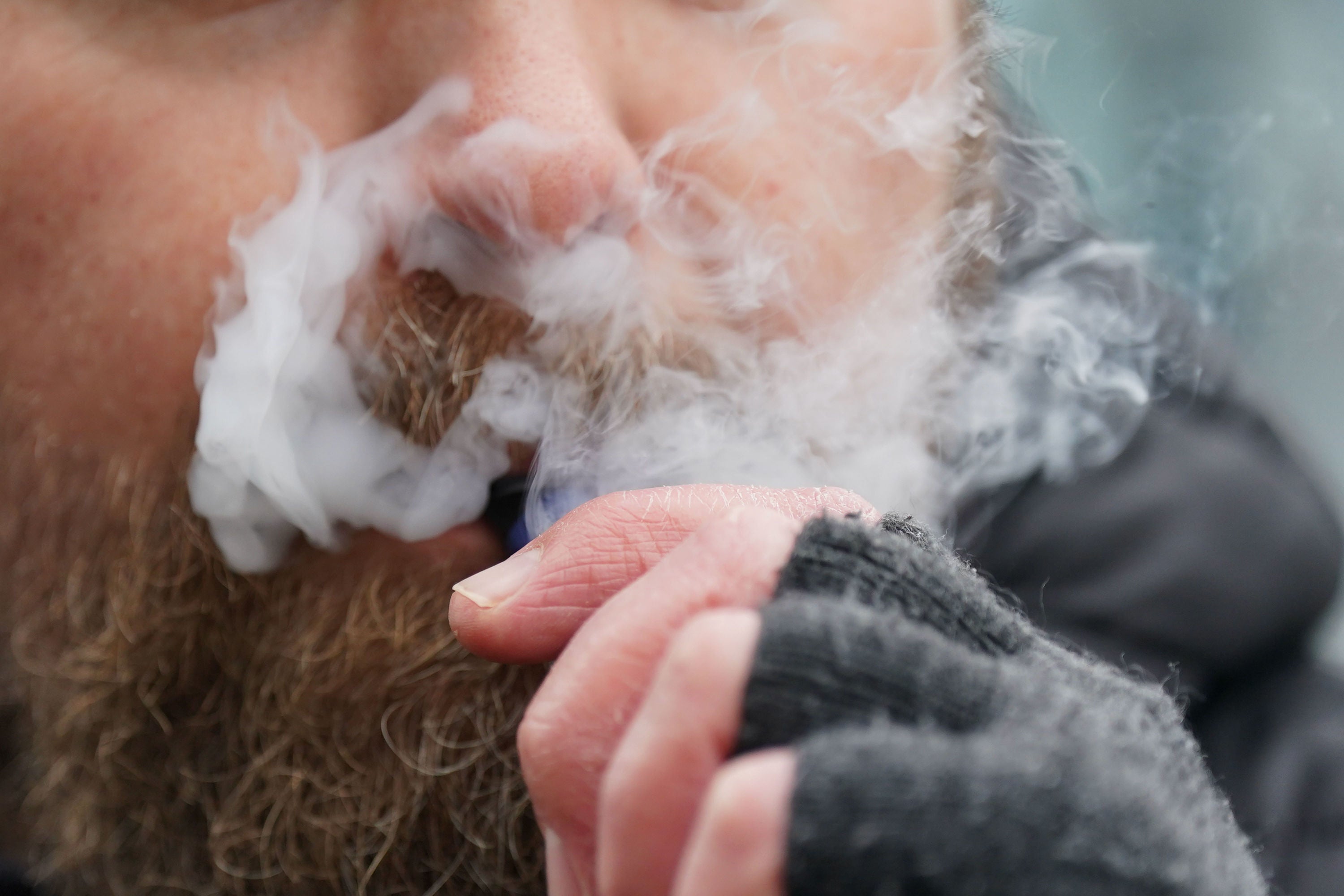 <p>A man using a disposable vape. The government is set to ban disposable vapes as part of plans to tackle the rising number of young people taking up vaping. Picture date: Monday January 29, 2024. PA Photo. See PA story POLITICS Vaping. Photo credit should read: Jacob King/PA Wire </p>
