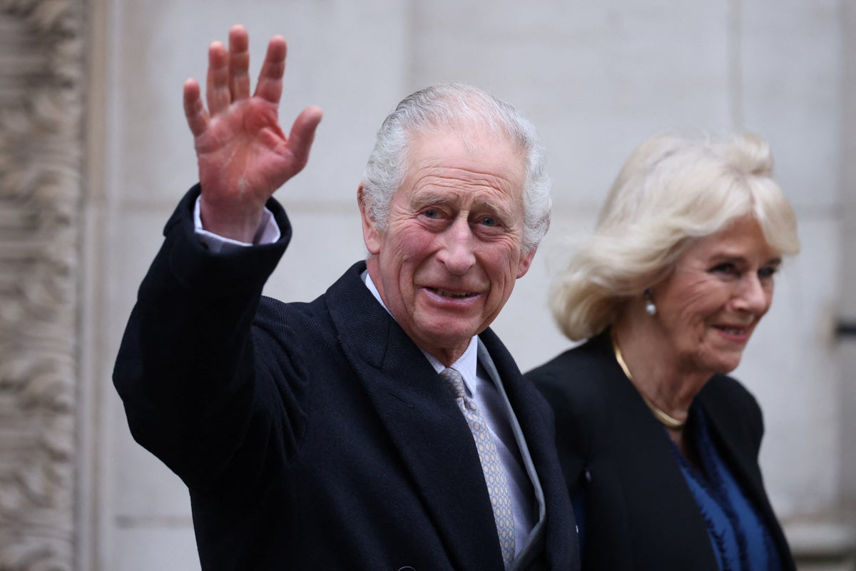King Charles smiles as he leaves hospital following prostate procedure