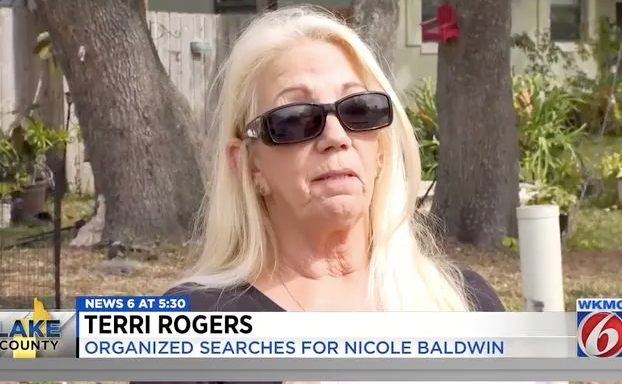 Terri Rogers, whose home was raided after organising searches for missing mother Nicole Baldwin