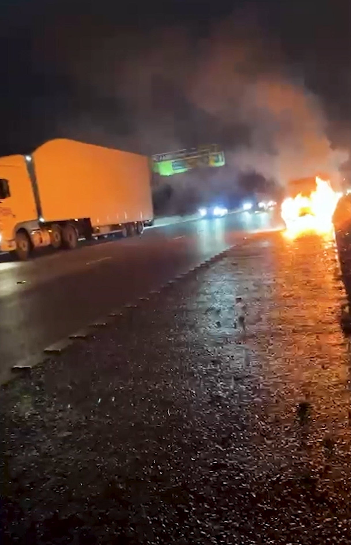 Footage of the couple’s car burning on the M61