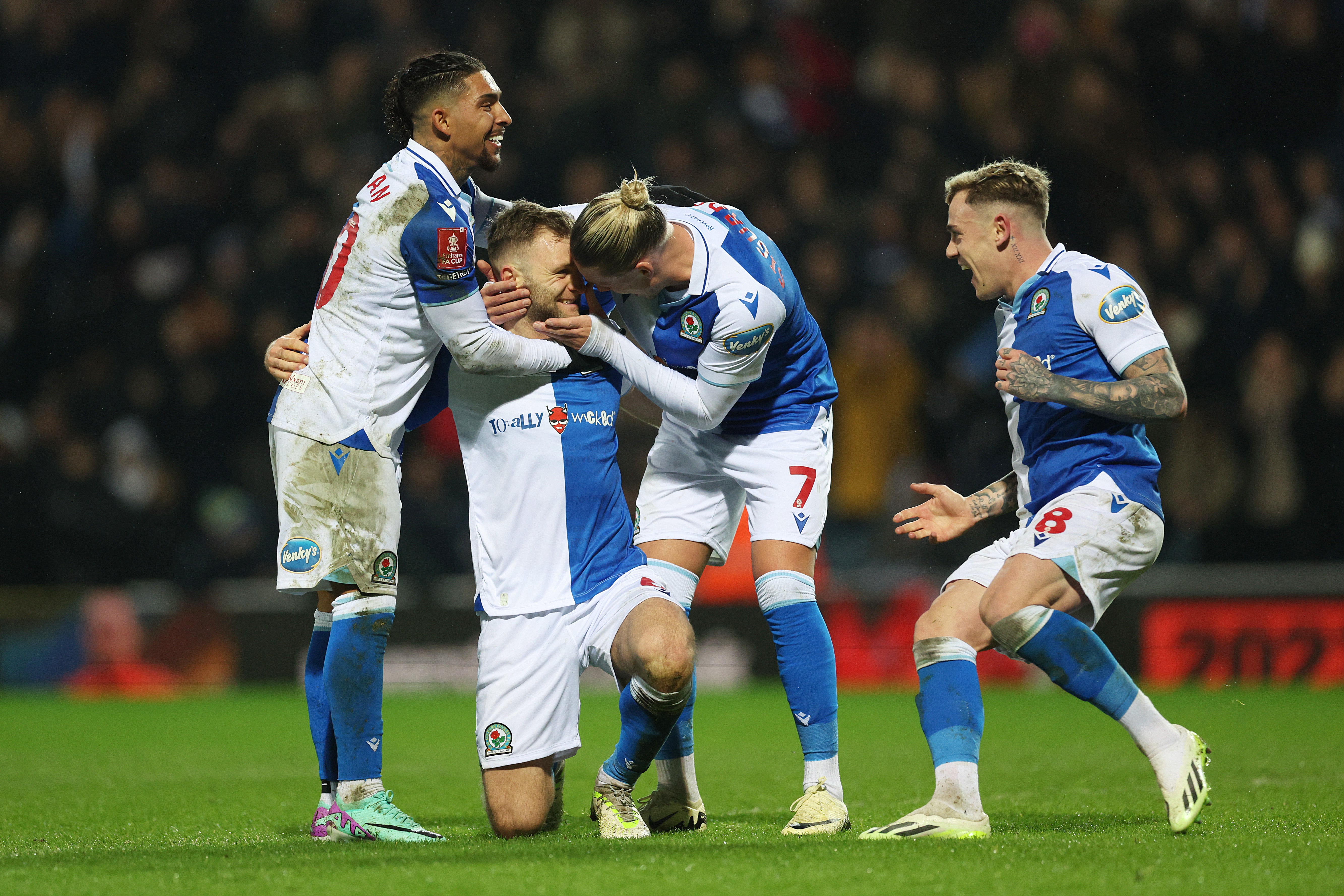 Sondre Tronstad, second left, celebrates after scoring Blackburn’s fourth goal