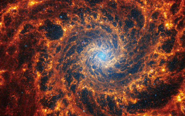 <p>Image of face-on spiral galaxy, NGC 628 as taken by Webb telescope</p>