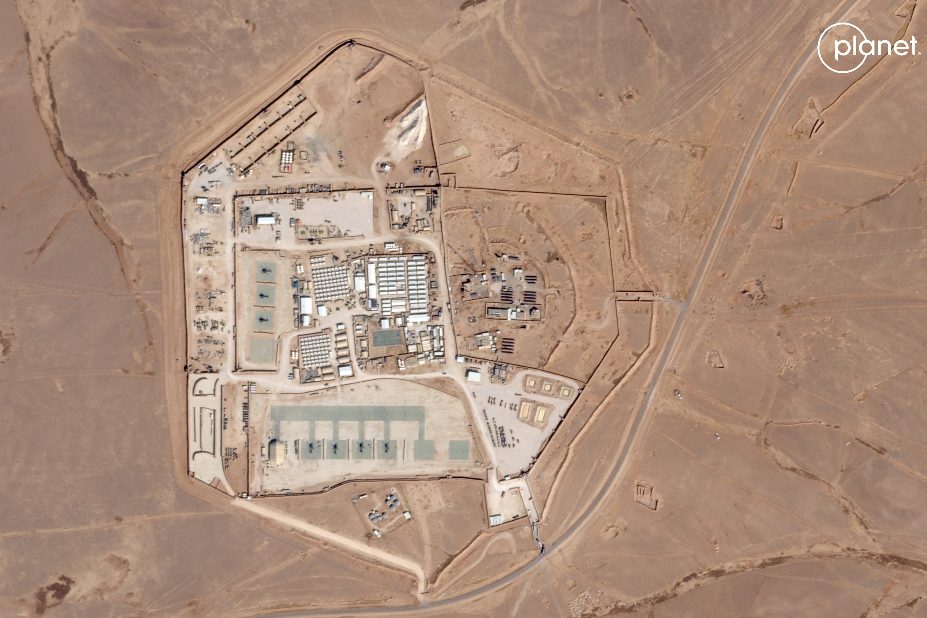 Satellite image shows a view of the base, known as Tower 22, which is operated by US troops as part of an international coalition against the Islamic State (IS) jihadist group, near Jordan's border with Iraq and Syria in the northeastern Rwaished District