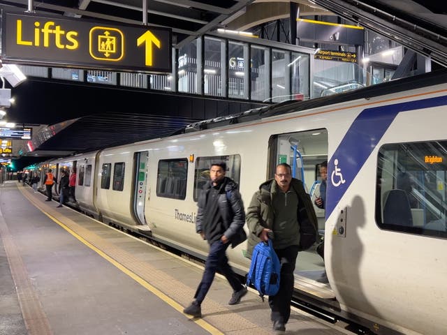 <p>Going places? Passengers leaving a Thameslink train at London Gatwick airport</p>