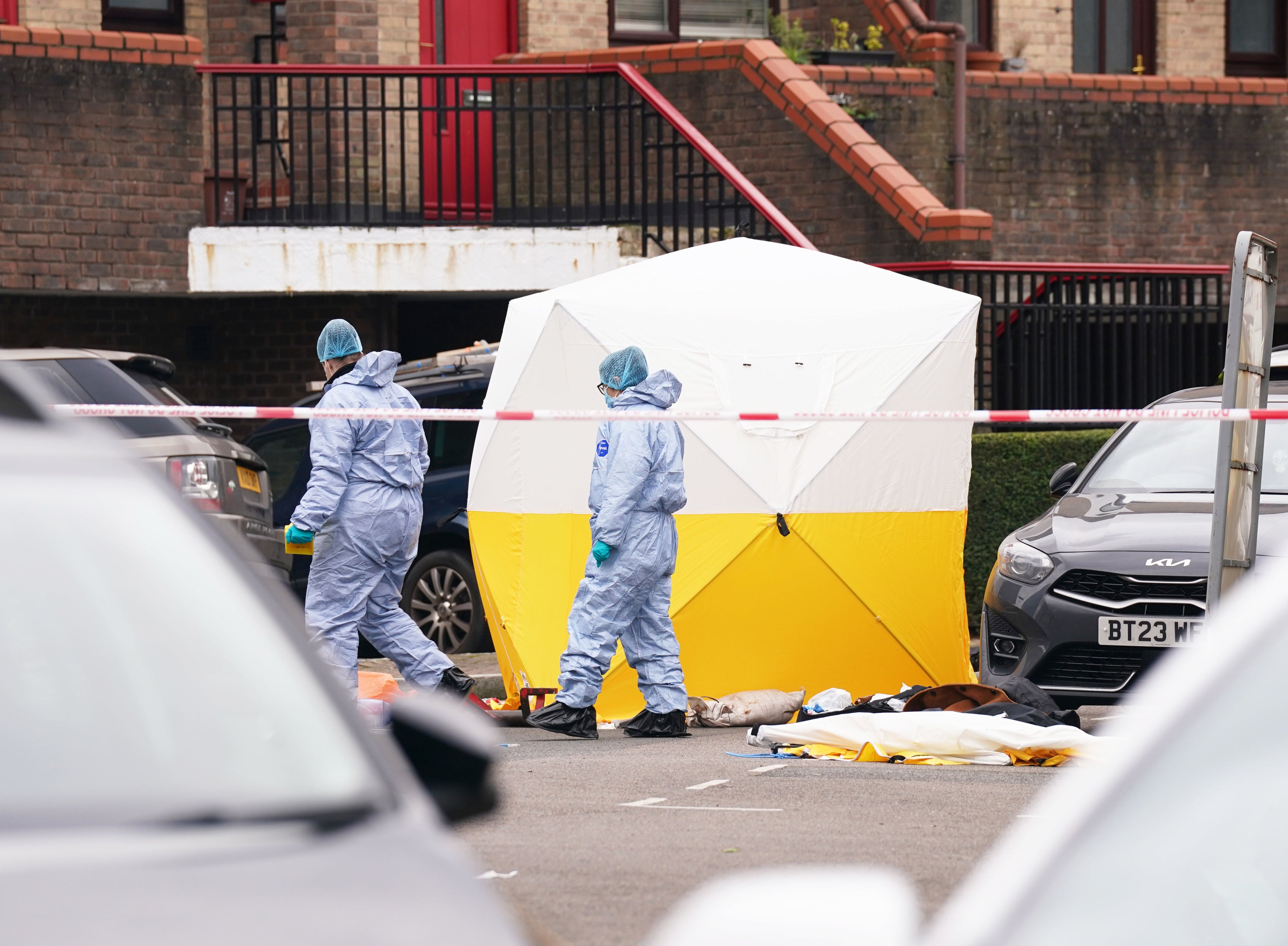 Police forensic officers at the scene near Bywater Place