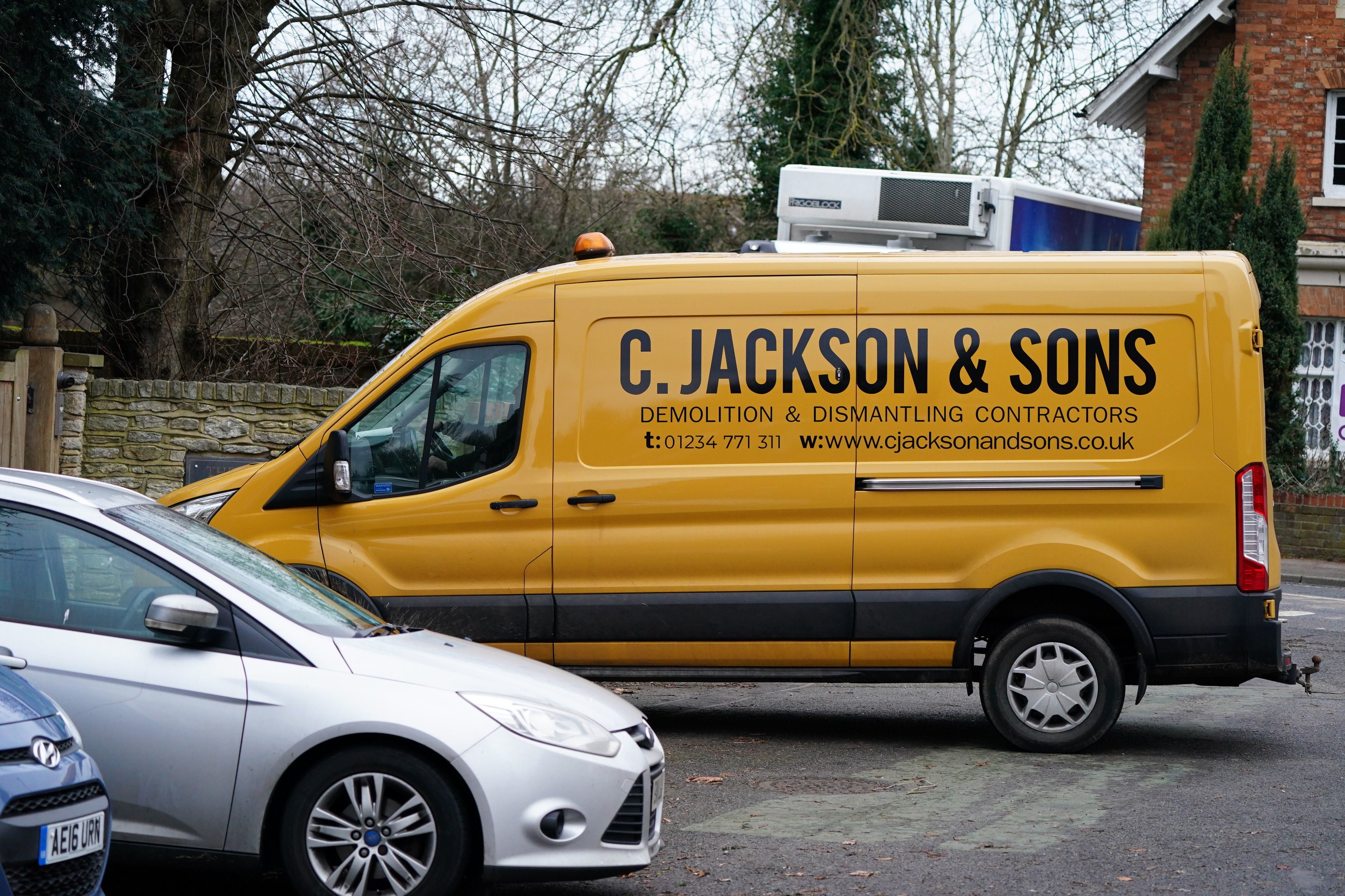 A van from a demolition and dismantling contractor drives into the grounds and home of Hannah Ingram-Moore