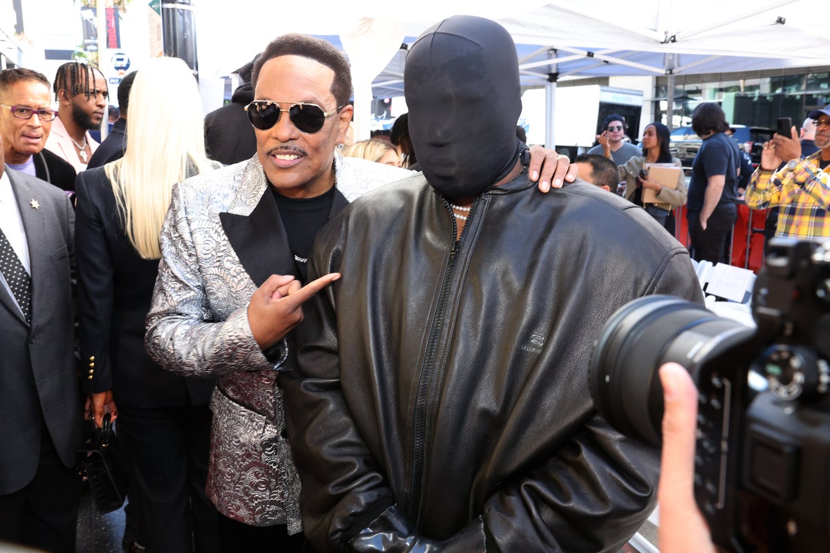 Kanye West wears bizarre full-face black mask during surprise Hollywood Walk of Fame appearance #KanyeWest
