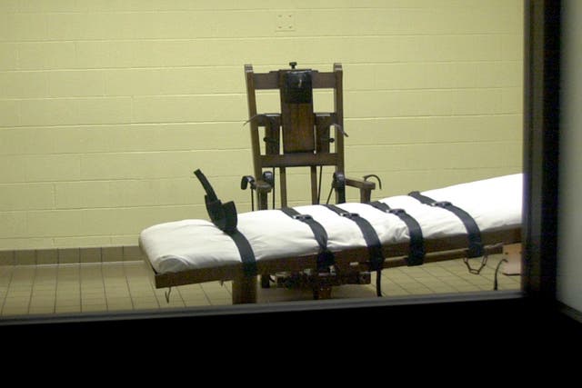 <p>A view of the death chamber from the witness room at the Southern Ohio Correctional Facility shows an electric chair and gurney August 29, 2001 in Lucasville, Ohio</p>