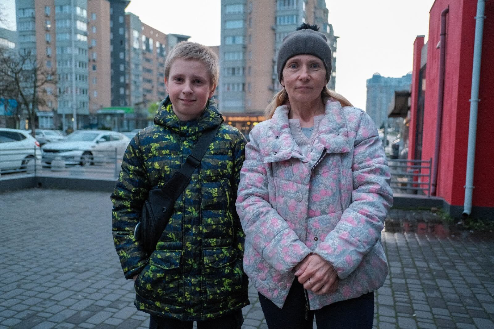 Bogdan Shvetzov, then 12, with his mother in Kyiv in April 2023. It was the first time they had seen each other in seven months