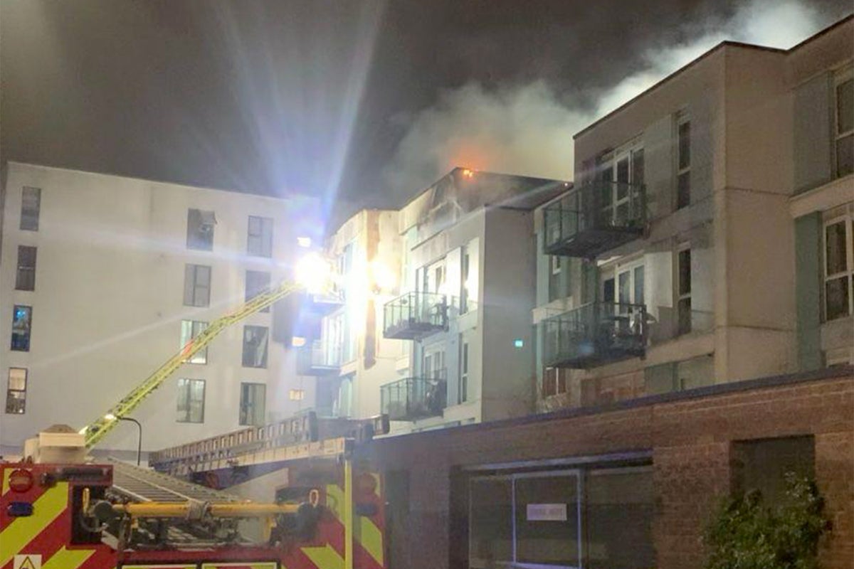 Terrified families escape flats fire involving cladding and demand urgent investigation