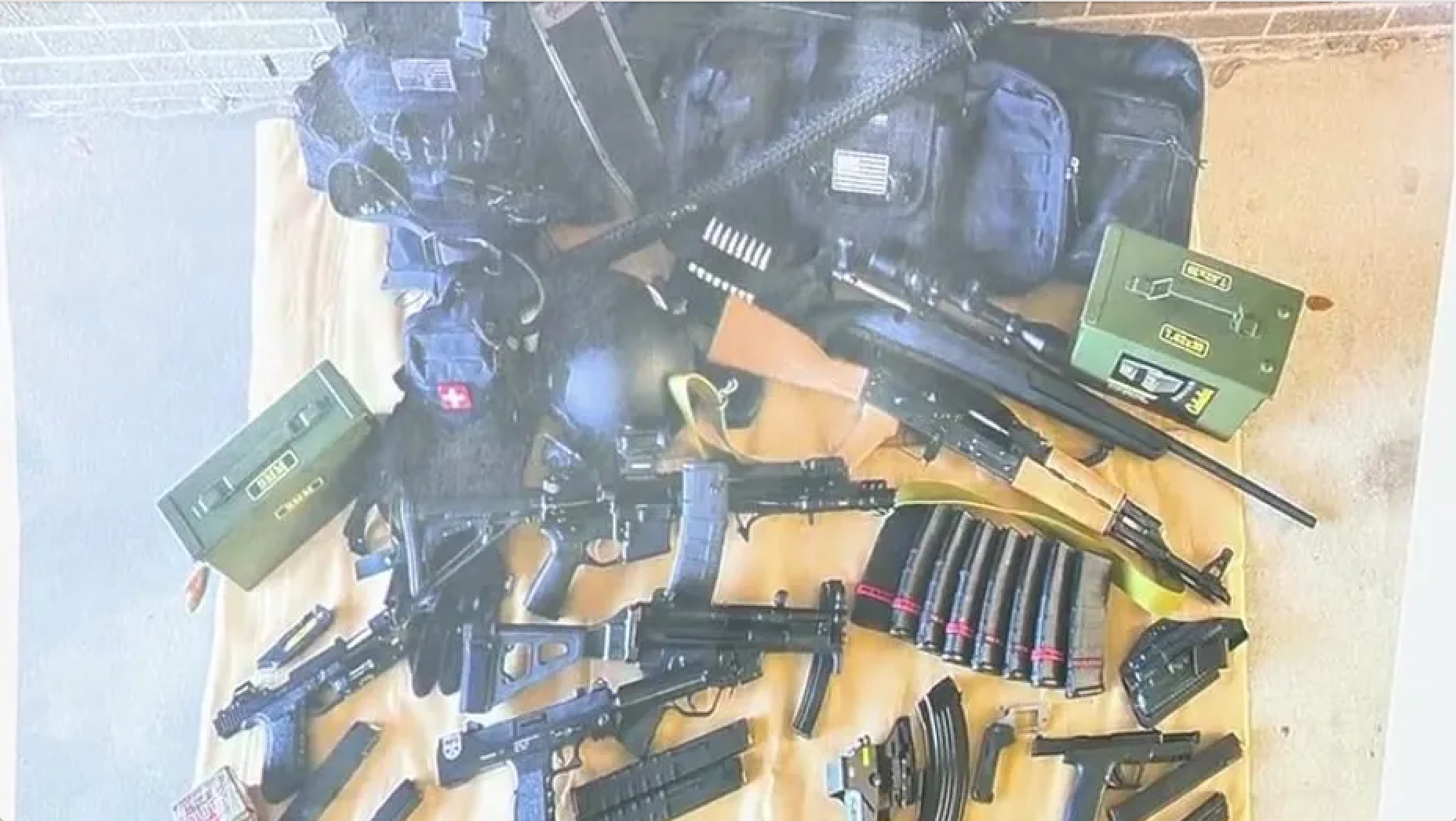 <p>The ‘arsenal’ of weapons and ammunition found in the gunman’s vehicle </p>