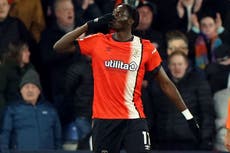 Elijah Adebayo scores Premier League hat-trick as Luton thump Brighton