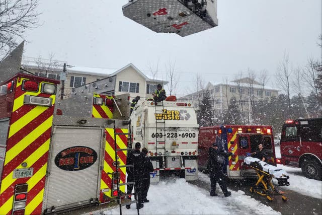 <p>New Hampshire woman survives after becoming trapped in garbage truck compactor</p>