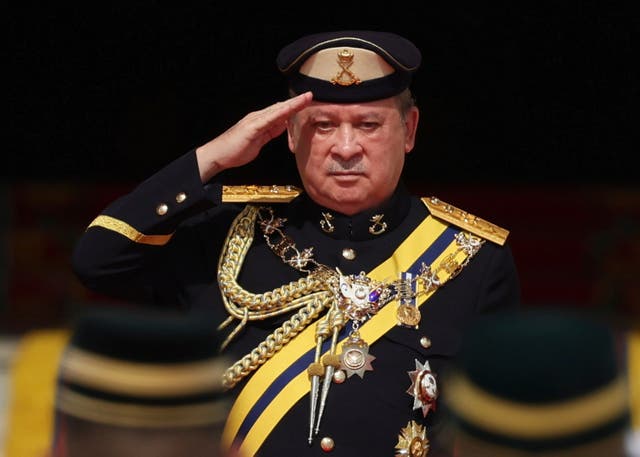 <p>Sultan of Johor, Sultan Ibrahim Iskandar, salutes the guard of honor at National Palace in Kuala Lumpur</p>