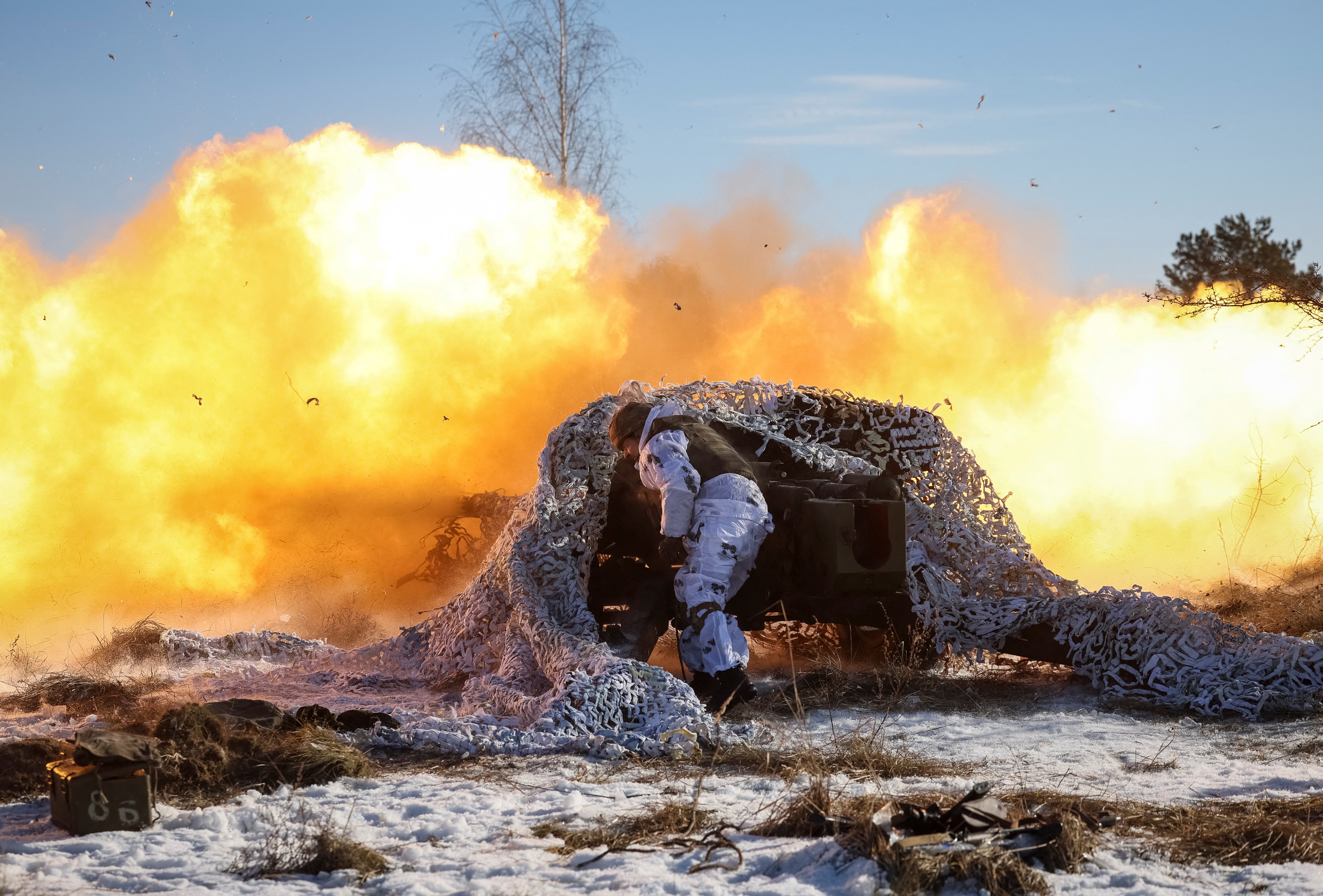 A Ukrainian serviceman fires during military exercises in western Ukraine