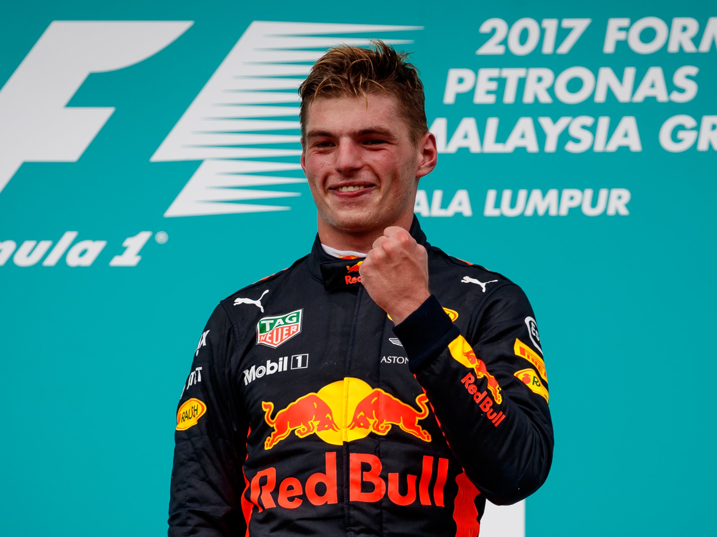 Max Verstappen celebrates winning the Malaysia Formula 1 Grand Prix in 2017