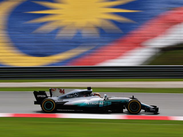 <p>Lewis Hamilton driving during practice for the Malaysia F1 Grand Prix in 2017</p>