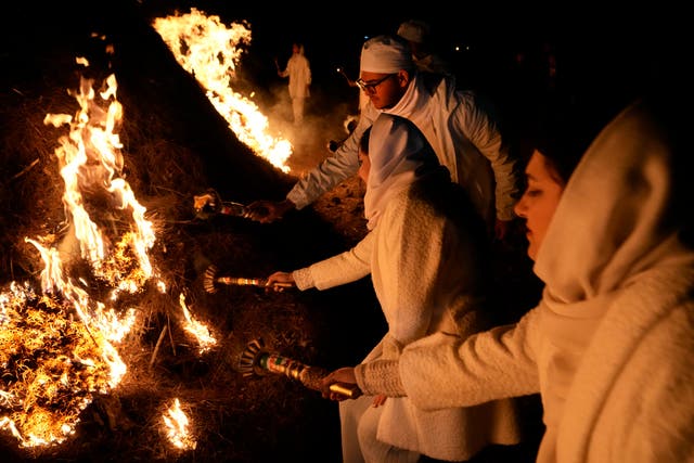 APTOPIX Iran Zoroastrians Sadeh Festival