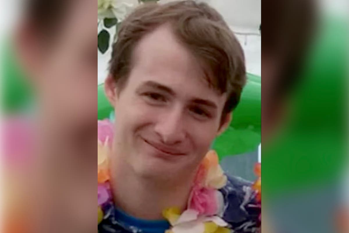 Crossbow stalker swung sword at police before he was shot dead during break-in