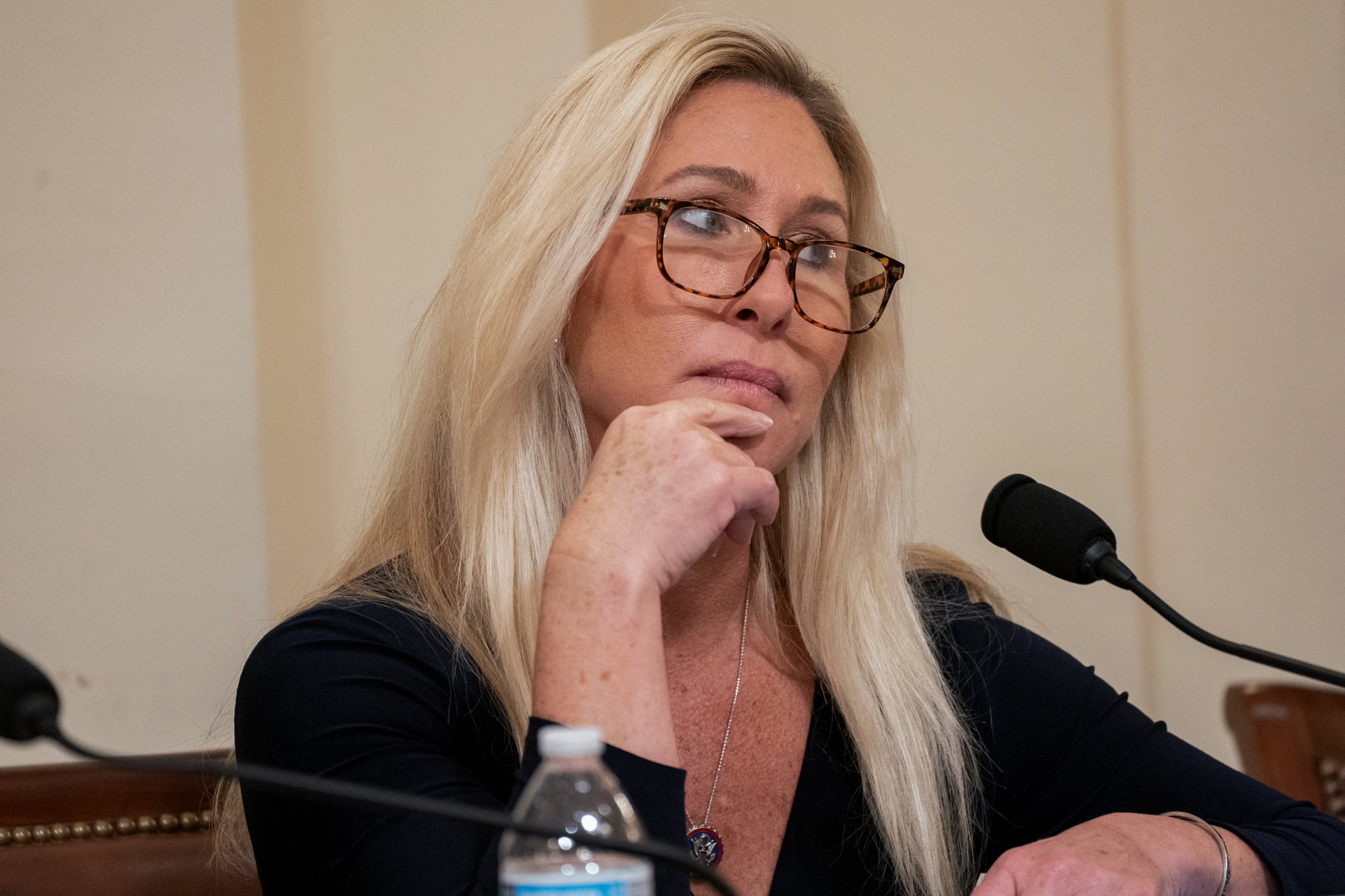 <p>US Rep Marjorie Taylor Greene listens as fellow members speak during a House Homeland Security Committee meeting to vote on impeachment charges against Alejandro Mayorkas on Capitol Hill, 30 January 2024</p>