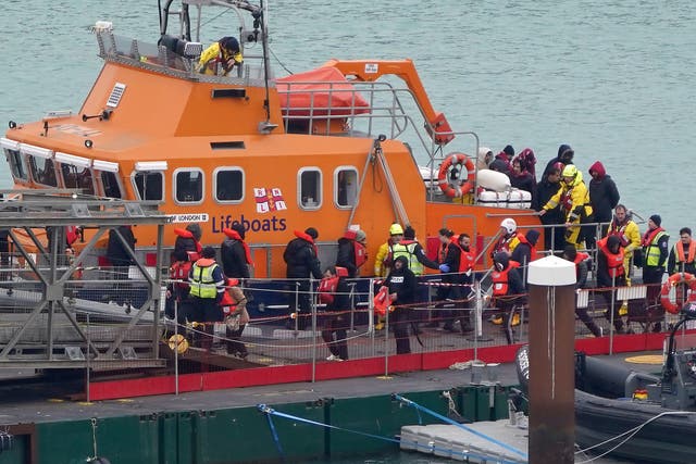<p>A group of people thought to be migrants are brought in to Dover, Kent, from the RNLI Dover Lifeboat following a small boat incident in the Channel</p>