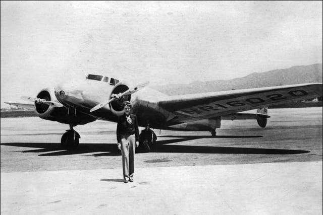 <p>Undated picture taken in the 30' s of US aviator Amelia Earhart in front of her plan</p>