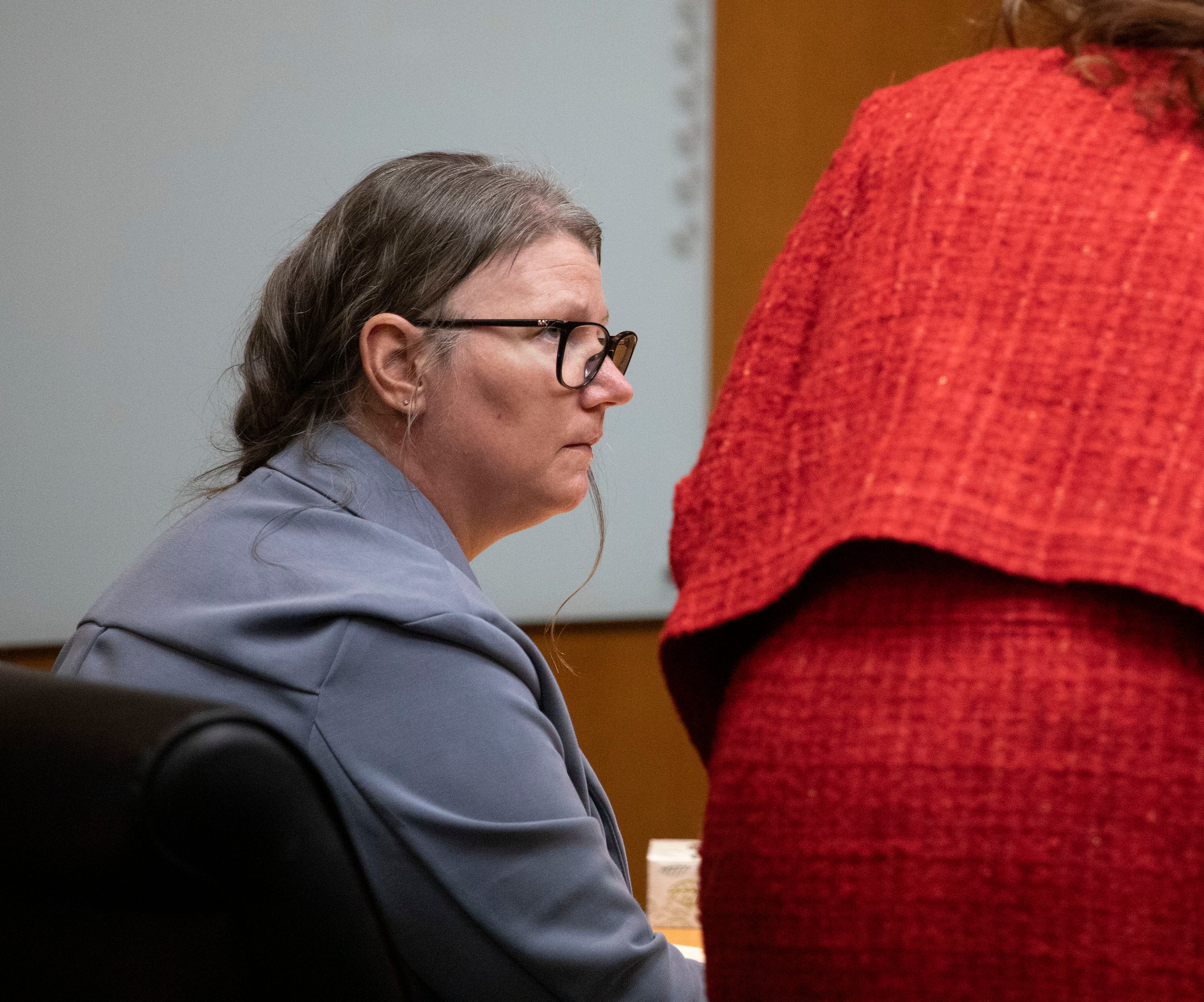 Jennifer Crumbley listening to a witness in her trial