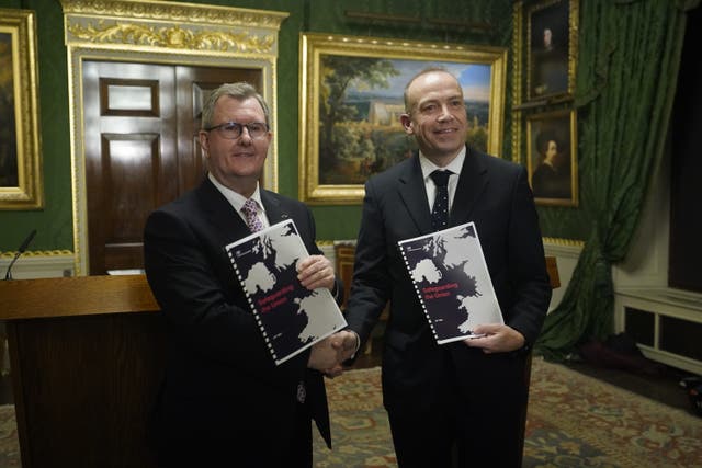 Northern Ireland Secretary Chris Heaton-Harris and DUP leader Sir Jeffery Donaldson during a joint press conference (Niall Carson/PA)