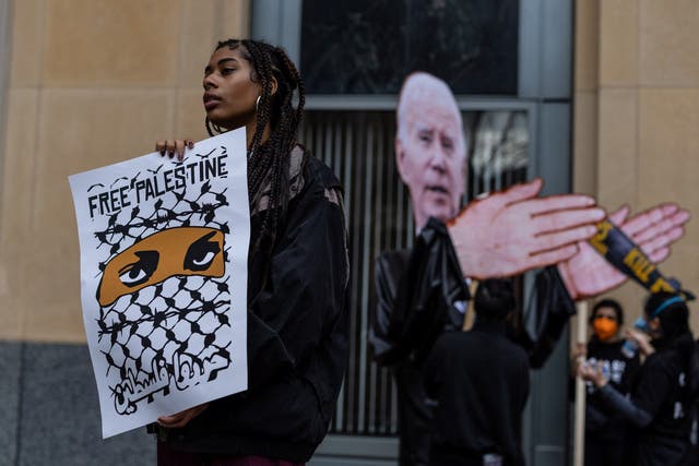 <p>Protesters demonstrate outside a federal court in Oakland, California, during a hearing in a lawsuit alleging President Joe Biden’s complicity in Palestinian genocide. </p>
