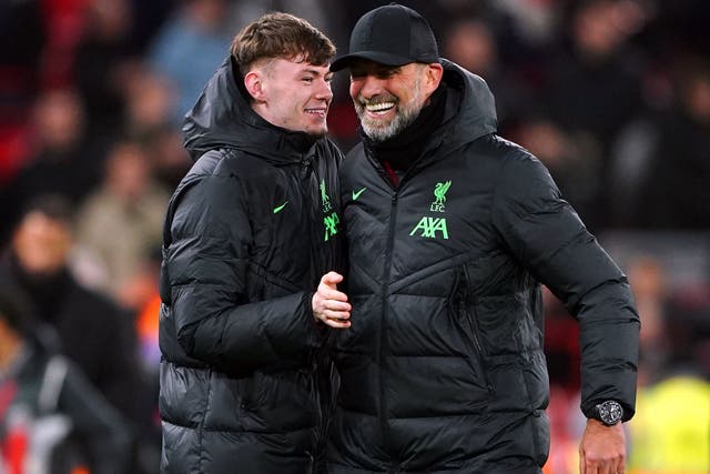 Liverpool manager Jurgen Klopp and Conor Bradley (Peter Byrne/PA)
