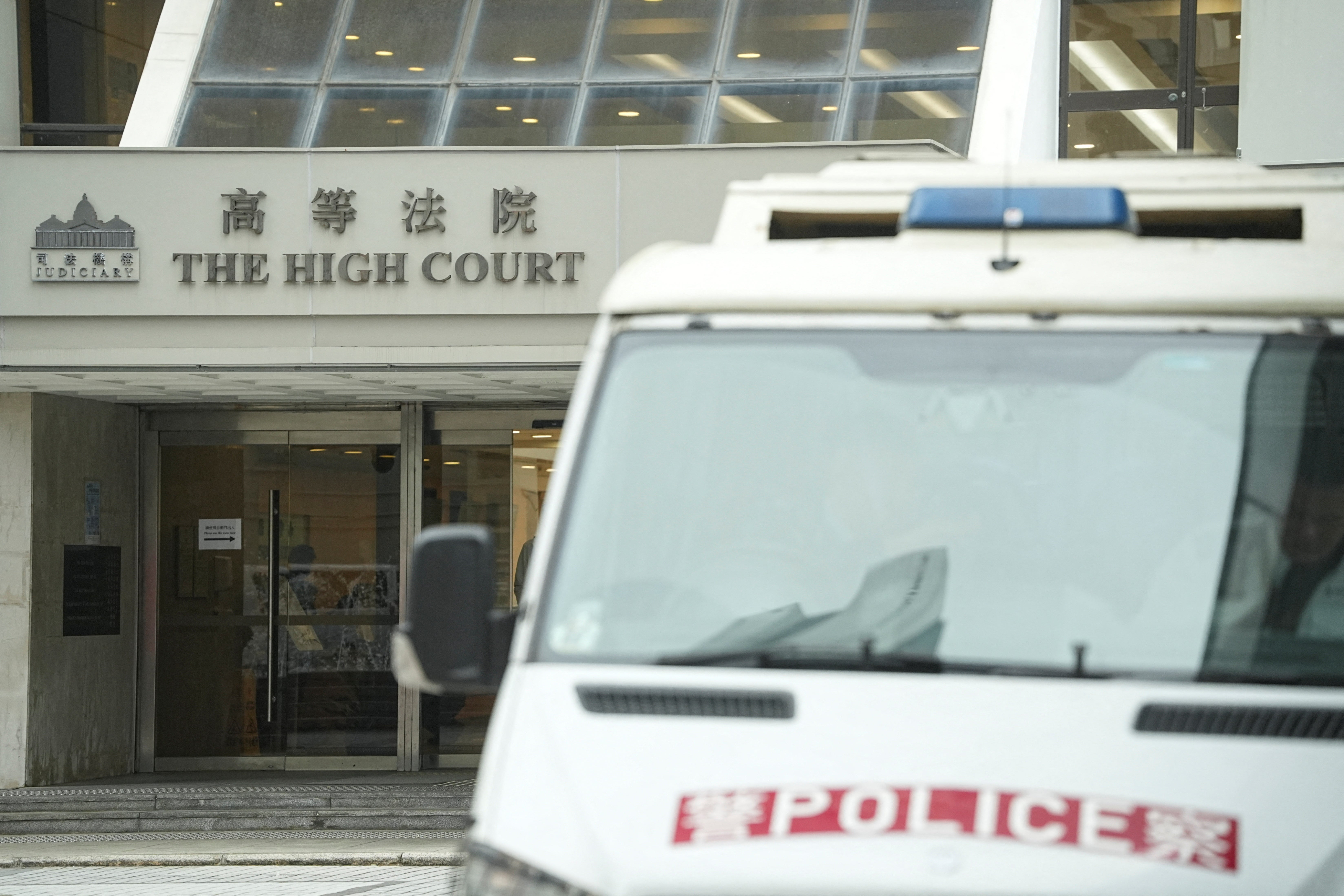 A police vehicle is pictured outside the High Court