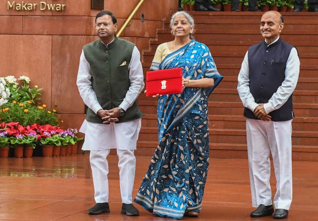 <p>India’s Finance Minister Nirmala Sitharaman holds up the file containing the country’s interim budget 2024
</p>