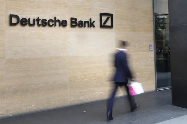 Deutsche Bank has announced job cuts as it bids to reduce costs (PA)