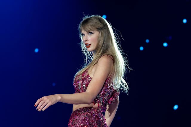 <p>Taylor Swift performing onstage in Arizona on the opening night of The Eras Tour</p>