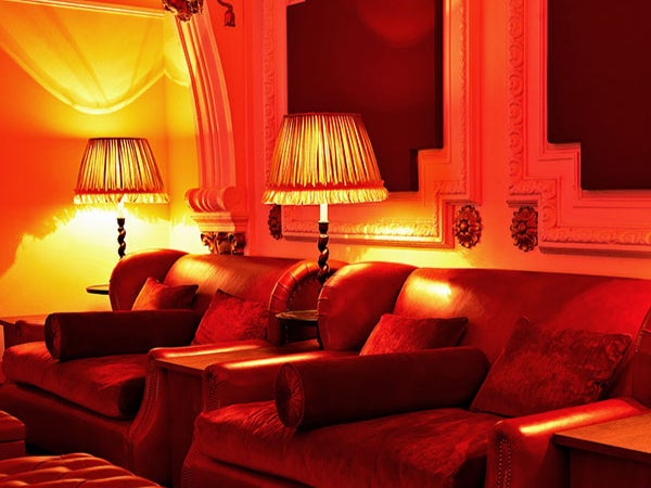 Sink into rich red beds for the latest flick in Notting Hill