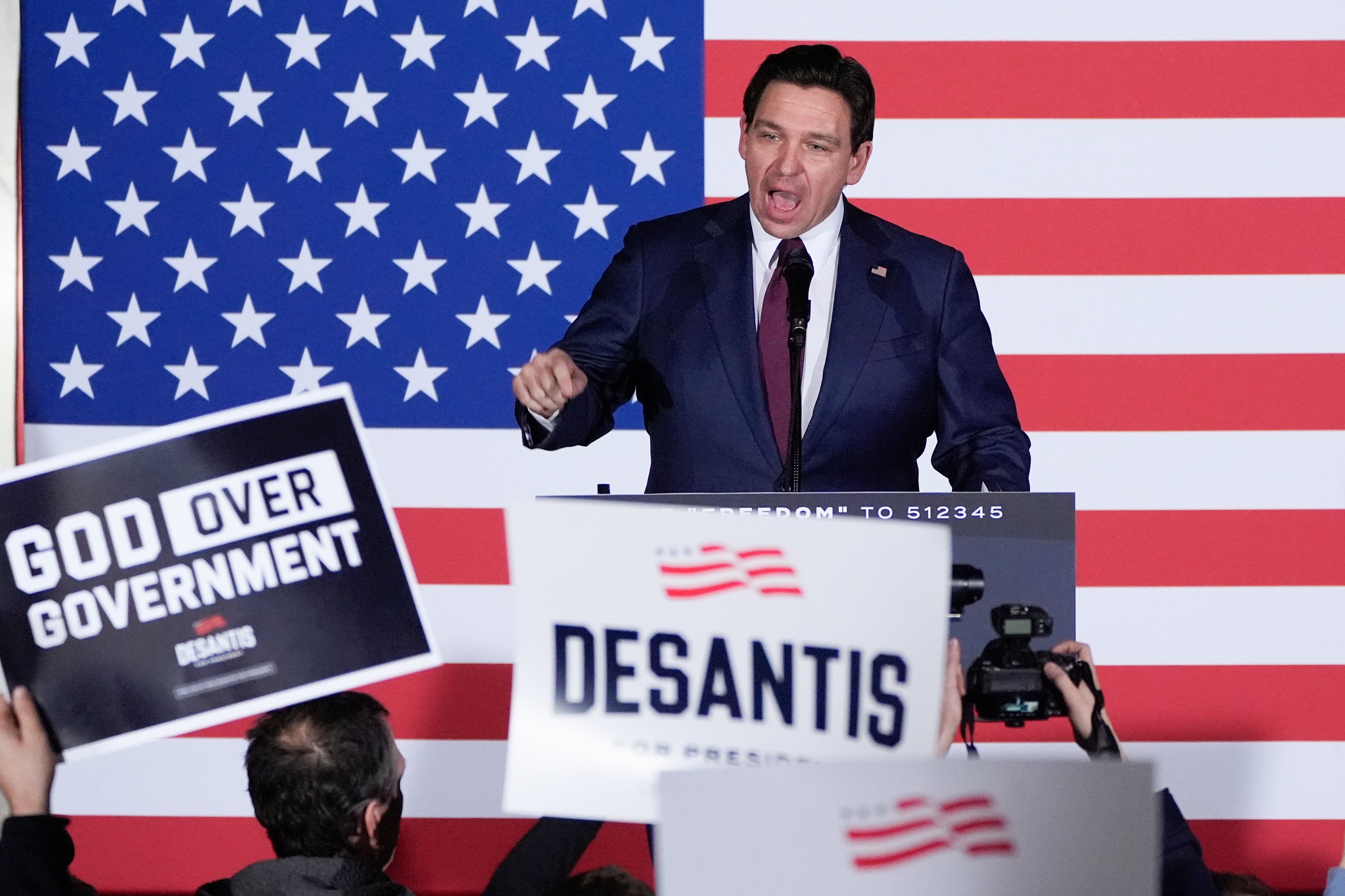 Ron DeSantis speaks to supporters in Iowa on 15 January.
