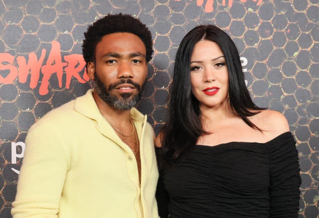 <p>Donald Glover and Michelle White</p>