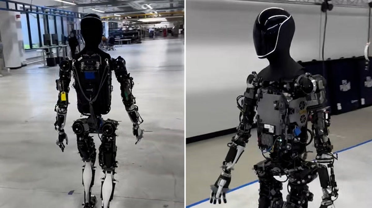 Elon Musk takes ‘spooky’ humanoid robot out for walk round factory