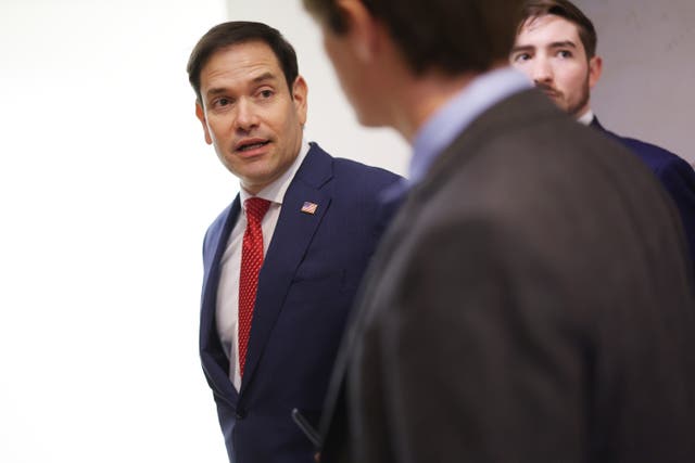 <p>Senate Intelligence Committee Vice Chairman Marco Rubio (R-FL) (L) arrives for an all-senators closed briefing where they will hear from Ukrainian President Volodymyr Zelensky via video conference at the U.S. Capitol on December 05, 2023 in Washington, DC.</p>