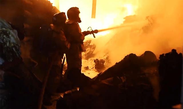 <p>Firefighters at the scene of fire in Nairobi, Kenya, Friday, 2 February 2024</p>