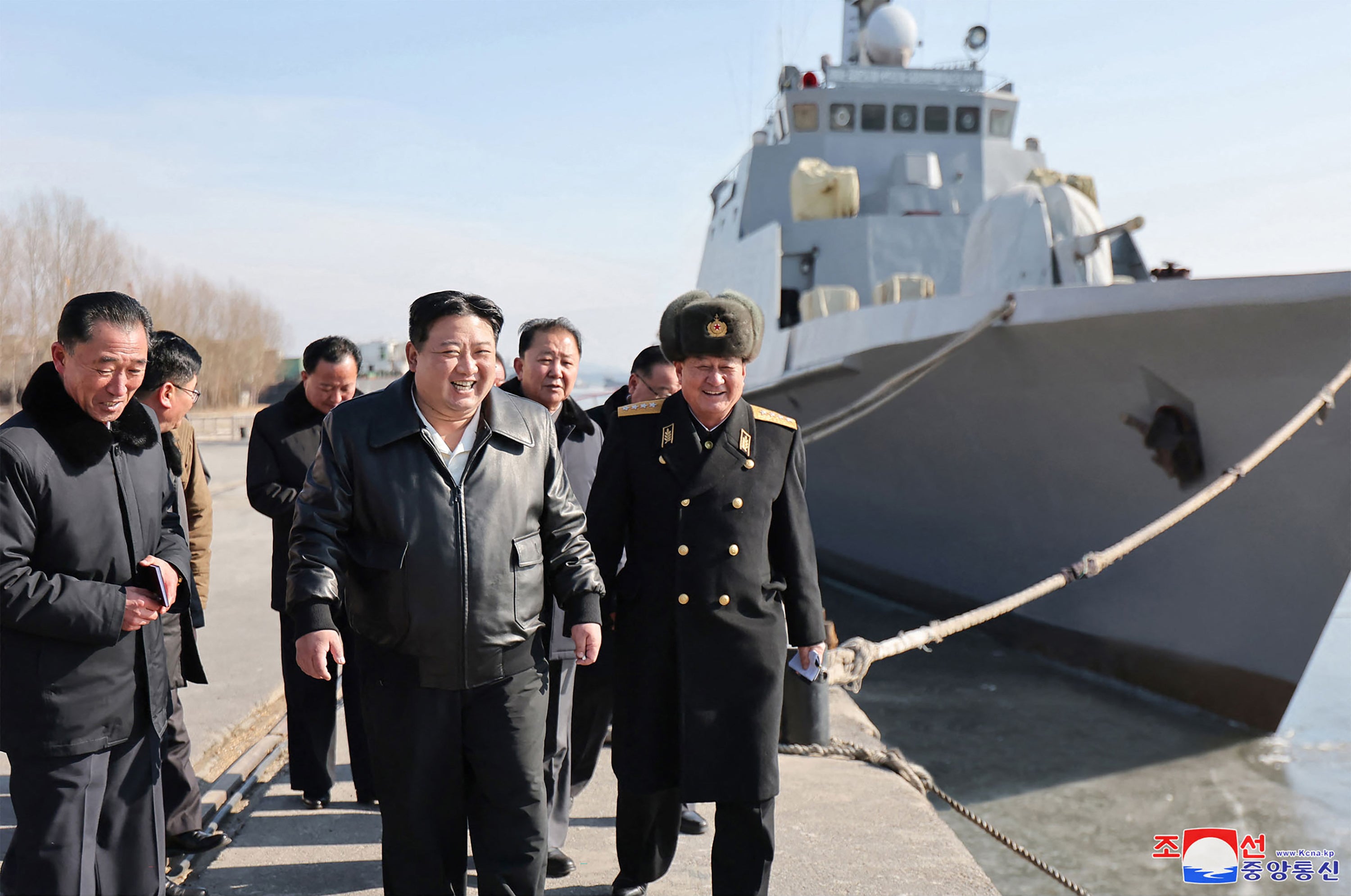 This undated photo released by North Korea’s official Korean Central News Agency (KCNA) on February 2, 2024 shows North Korean leader Kim Jong Un (C) inspecting the Nampho Dockyard in North Korea