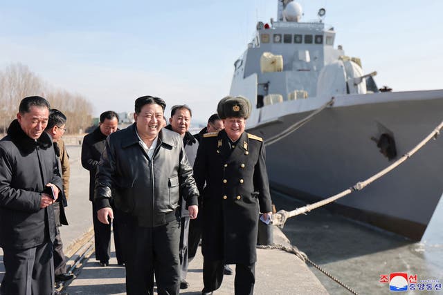 <p>This undated photo released by North Korea’s official Korean Central News Agency (KCNA) on February 2, 2024 shows North Korean leader Kim Jong Un (C) inspecting the Nampho Dockyard in North Korea</p>