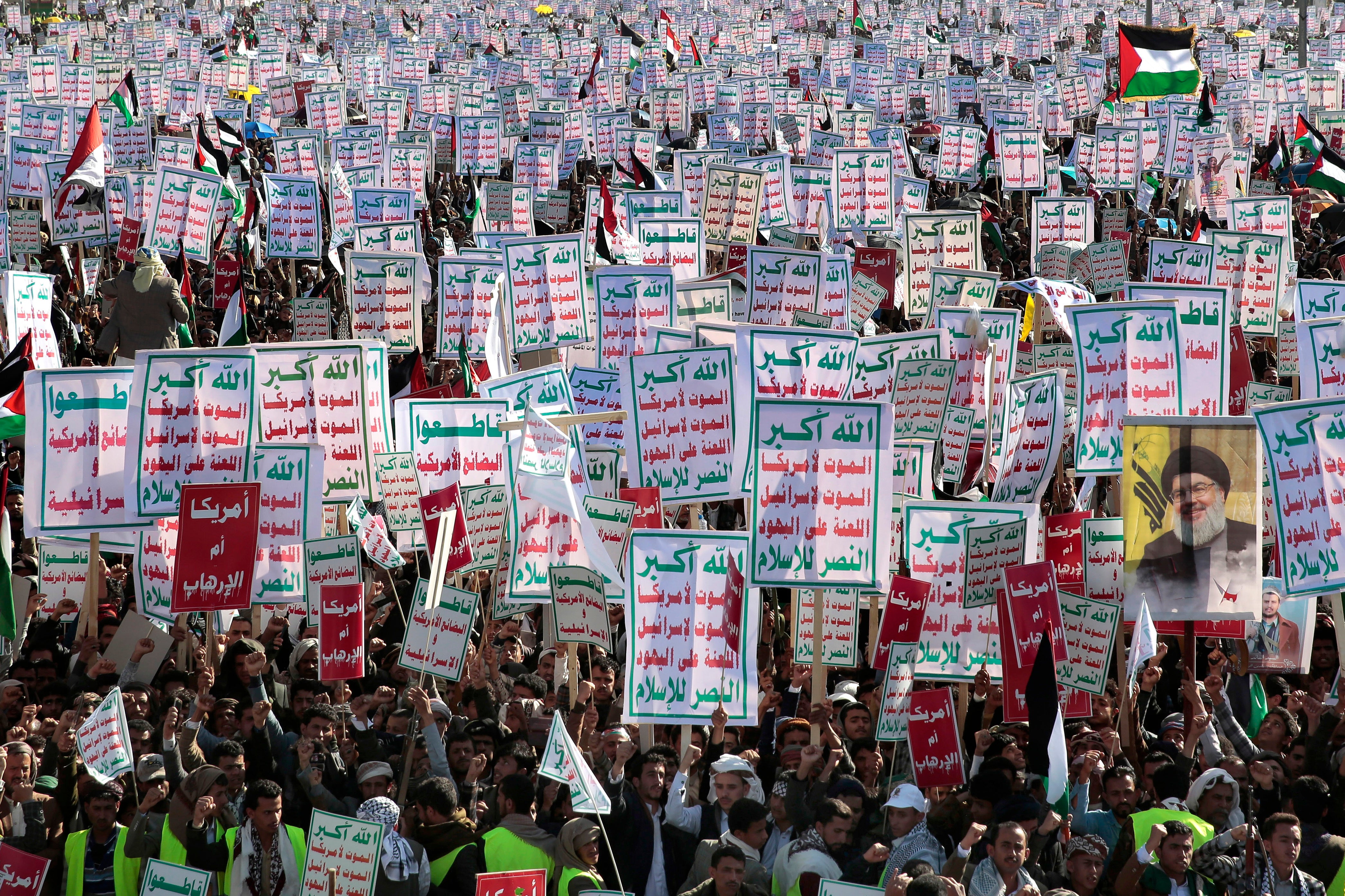Houthi supporters attend a rally in support of the Palestinians in the Gaza Strip and against the US-led airstrikes on Yemen