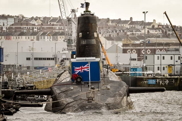 <p>HMS Vanguard, the V-Class UK nuclear deterrent submarine docked at Devonport, Plymouth</p>