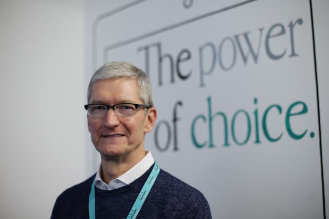 Apple chief executive Tim Cook has said the company is spending a tremendous amount of time and effort on AI (Yui Mok/PA)