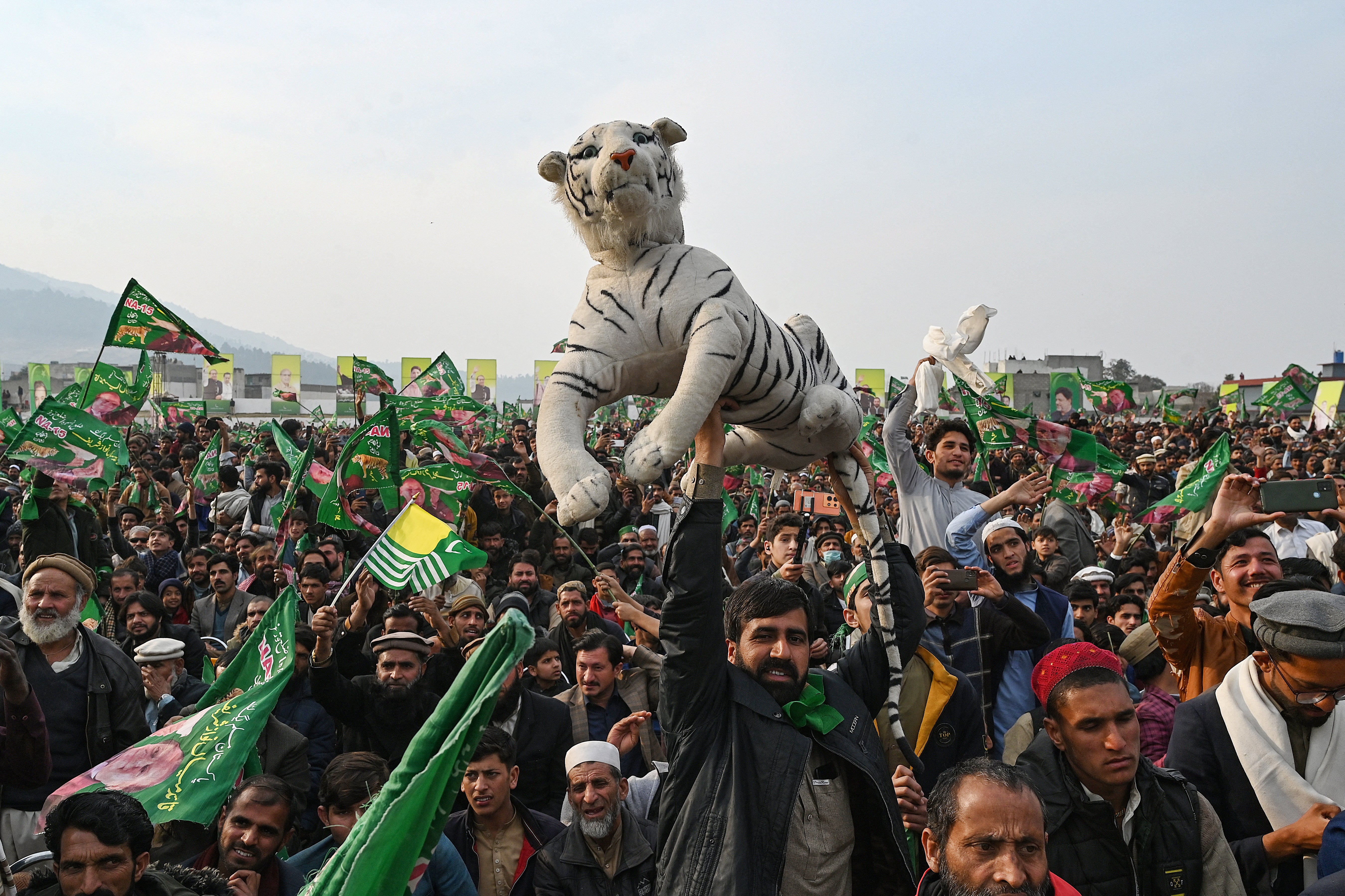 Pakistan Muslim League – Nawaz (PML-N) supporters attend an election campaign rally for Nawaz Sharif at Mansehra, Khyber Pakhtunkhwa province