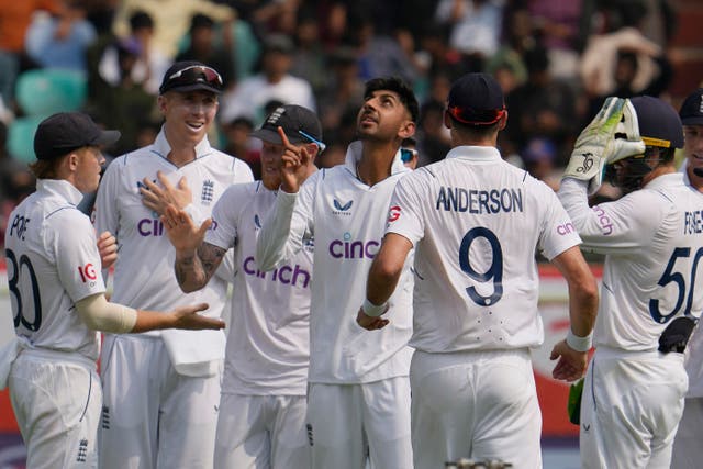 Shoaib Bashir celebrates the wicket of India’s captain Rohit Sharma (Manish Swarup/AP)