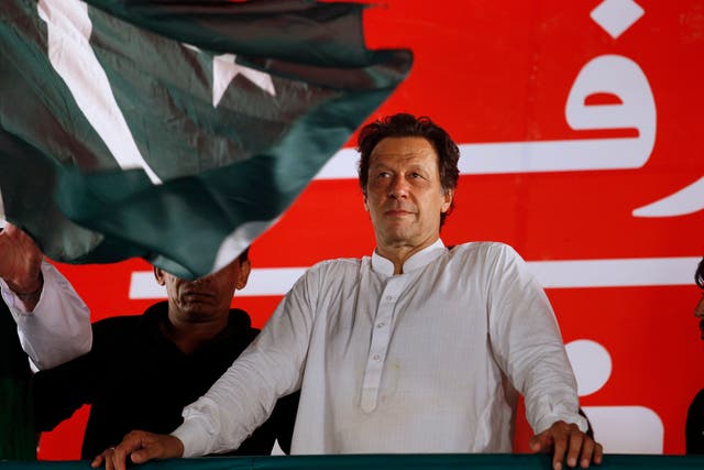 <p>Pakistani politician Imran Khan, chief of Pakistan Tehreek-e-Insaf party, arrives to address an election campaign rally in Islamabad in 2018 – today he’s facing a lifetime behind bars </p>